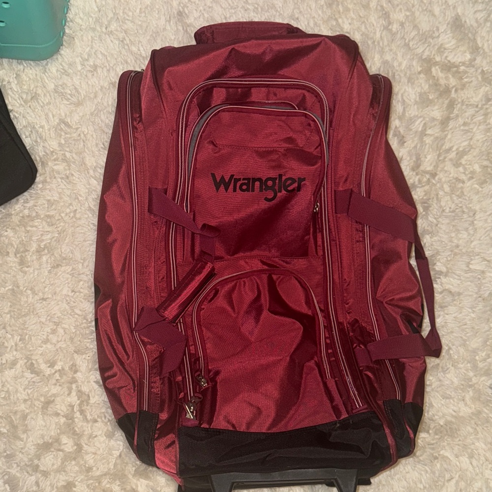 30” Wesley Wrangler rolling Burgundy Travel Duffel bag